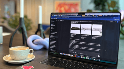 Laptop with Chatgpt open on screen, showing a search for sofas
